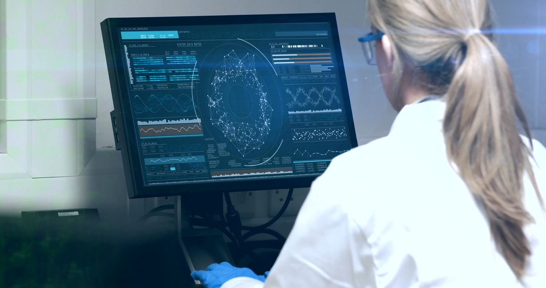 Female Scientist Analyzing Data on Interactive Computer Display - Free Images, Stock Photos and Pictures on Pikwizard.com