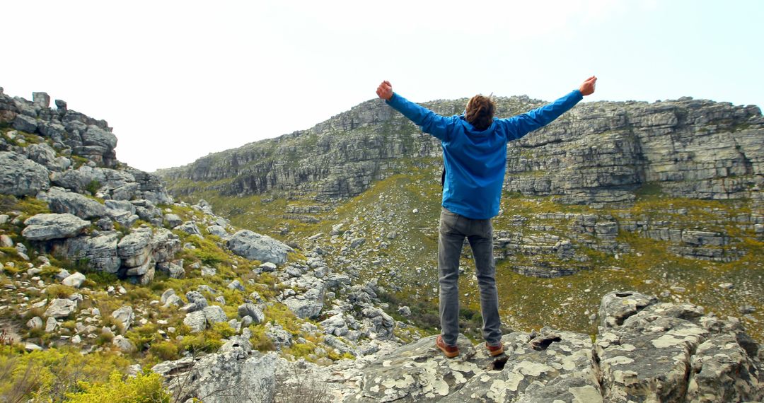 Celebrating Success on Mountain Rocky Summit Adventures - Free Images, Stock Photos and Pictures on Pikwizard.com