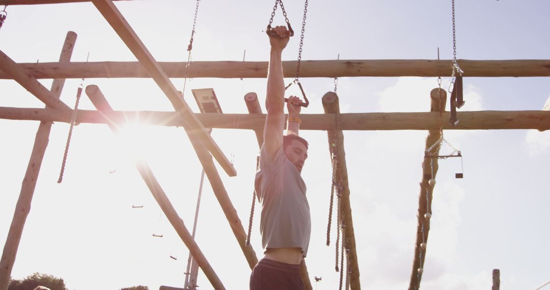 Man training on outdoor obstacle course at sunrise - Free Images, Stock Photos and Pictures on Pikwizard.com