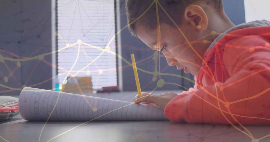 Young Student Writing with Networking Overlay Representing Innovation