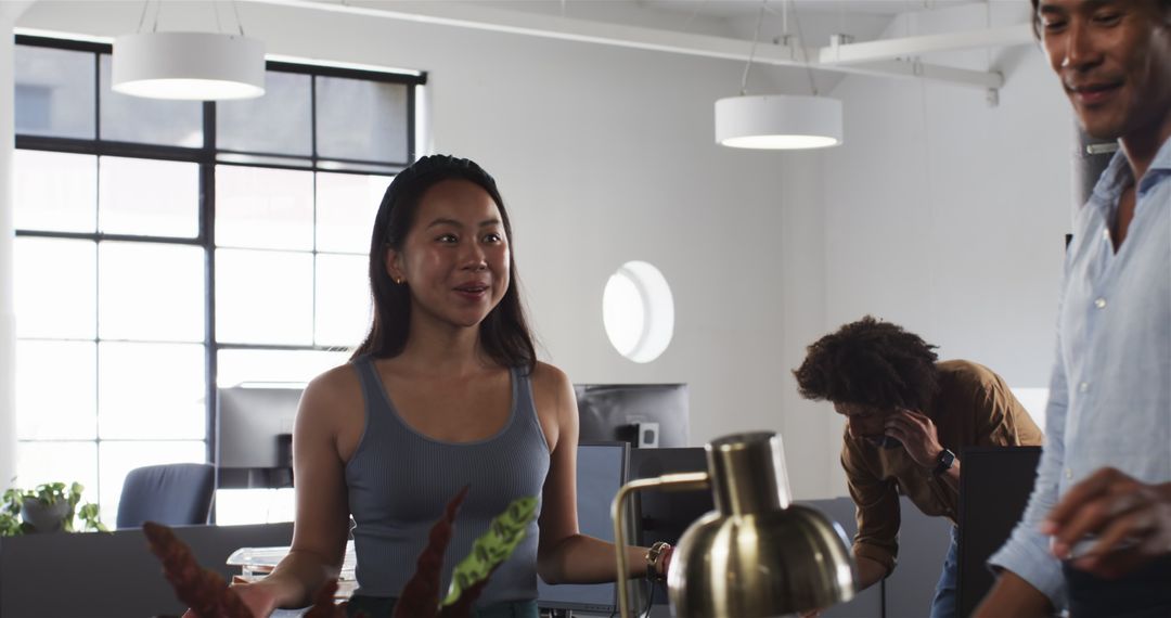 Multinational Team Collaborating in Modern Office Environment