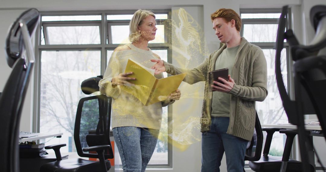 Innovative Coworkers Collaborating with Digital Technology in Modern Office