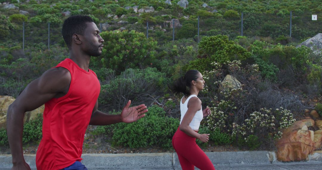 Determined Couple Running in Scenic Mountain Location