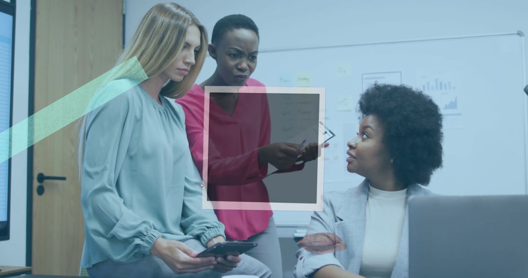 Diverse Business Team Discussing Data in Modern Office