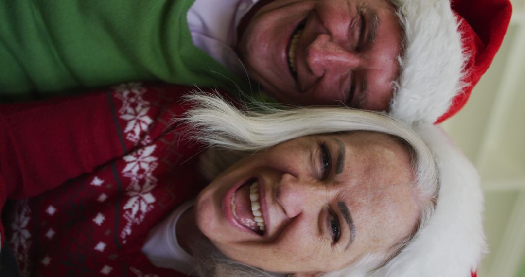 Happy Elderly Couple Celebrating Christmas Together - Free Images, Stock Photos and Pictures on Pikwizard.com