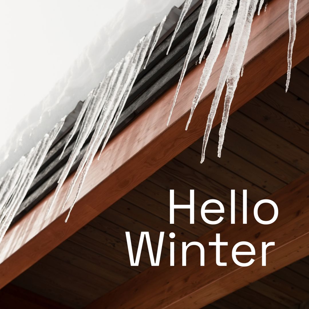 Icicles on Rooftop with Hello Winter Text Seasonal Greeting
