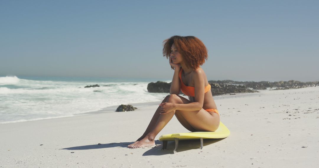 Happy Woman Relaxing on Beach with Surfboard - Free Images, Stock Photos and Pictures on Pikwizard.com