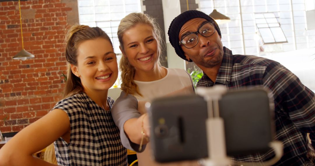 Group of Friends Taking Selfie in Stylish Urban Café - Free Images, Stock Photos and Pictures on Pikwizard.com