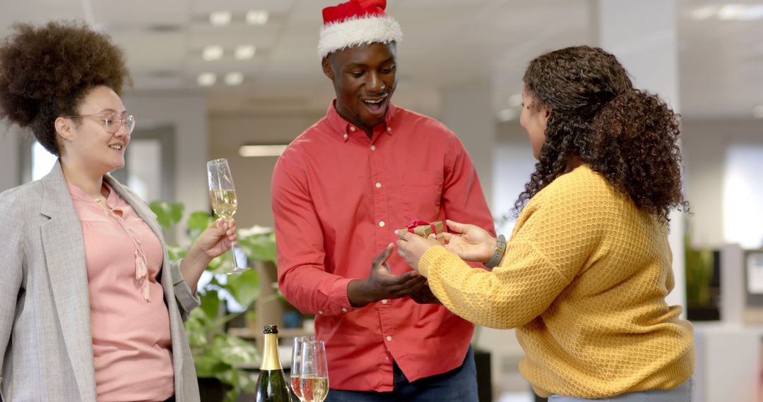 Diverse Office Team Celebrating Christmas with Champagne - Free Images, Stock Photos and Pictures on Pikwizard.com