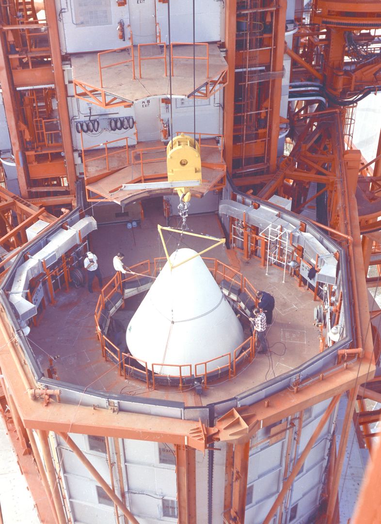 Workmen Positioning Nose Cone for Apollo 5 Lunar Module at Kennedy Space Center - Free Images, Stock Photos and Pictures on Pikwizard.com