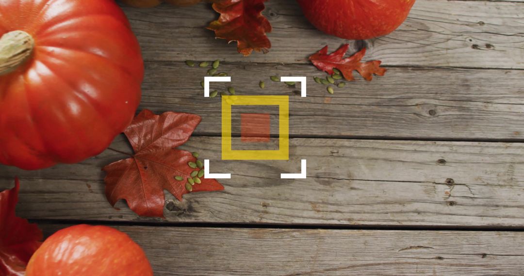 Rustic Autumn Leaves and Pumpkins on Weathered Wood