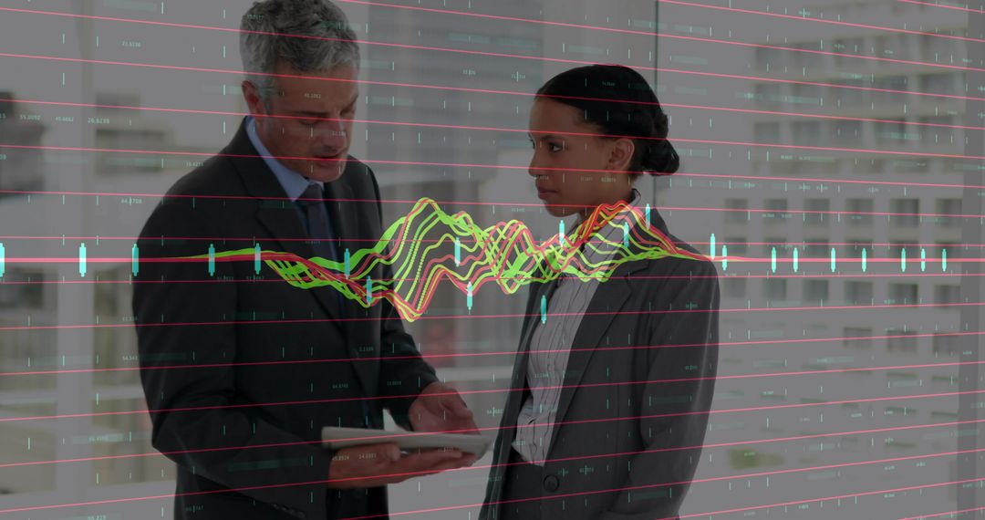 Business executives analyzing financial data overlay on tablet in modern office
