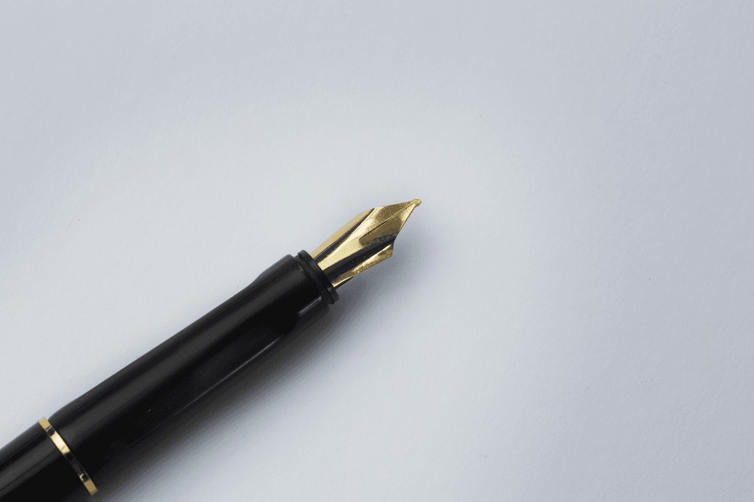 Transparent Precision: Fountain Pen on White Paper