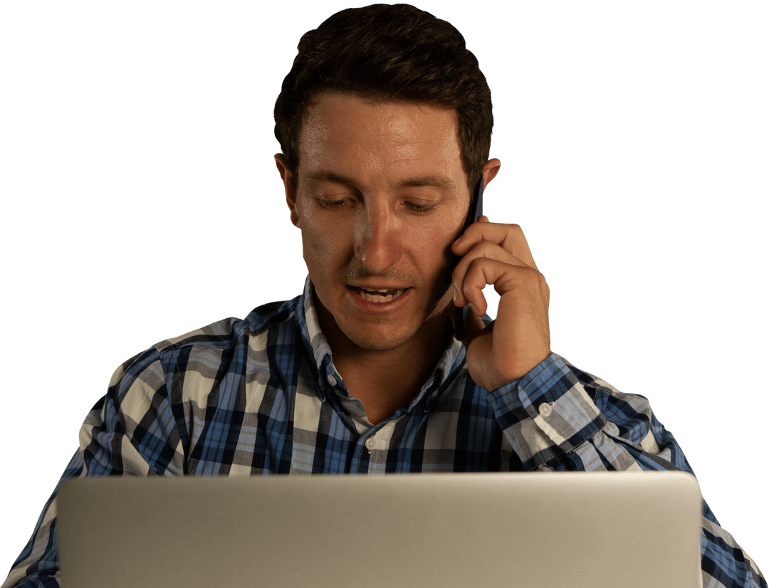 Professional Man in Checkered Shirt on Smartphone with Transparent Laptop