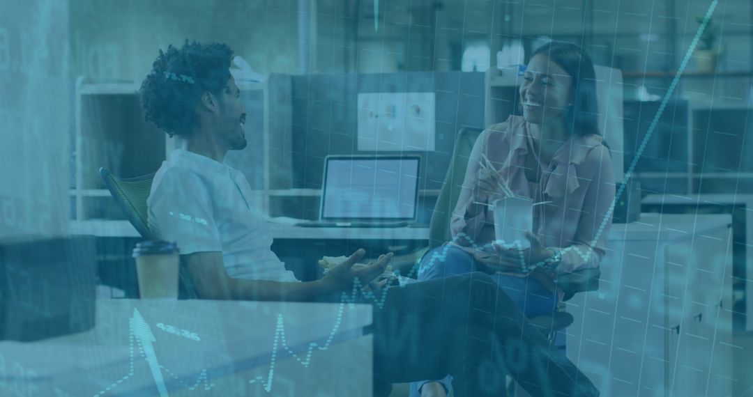 Professionals Collaborating in Open-Plan Office With Technology