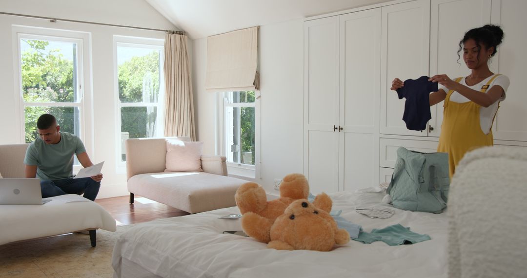 Couple Managing Family Tasks at Home, Bonding Through Teamwork