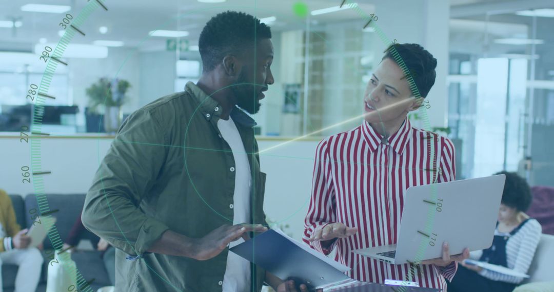 Professional Team Discussing Documents and Ideas in Modern Office