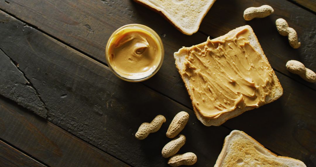 Toast Spread with Creamy Peanut Butter on Rustic Table