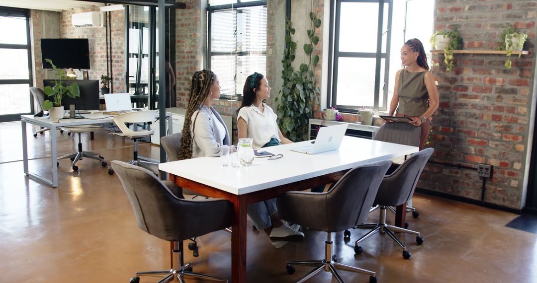 Team Discussing in Modern Office