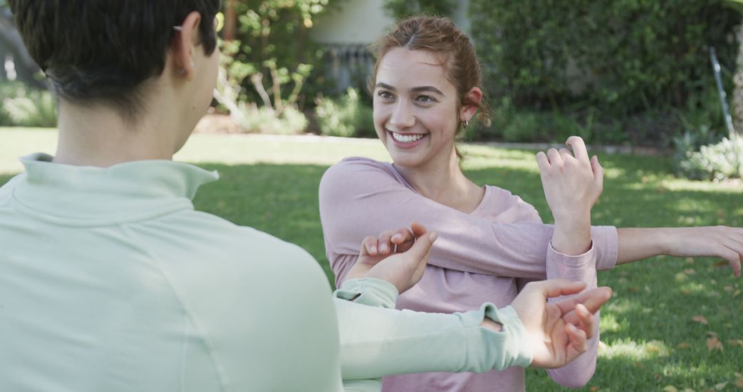 Caucasian Couple Enjoying Outdoor Stretching Routine