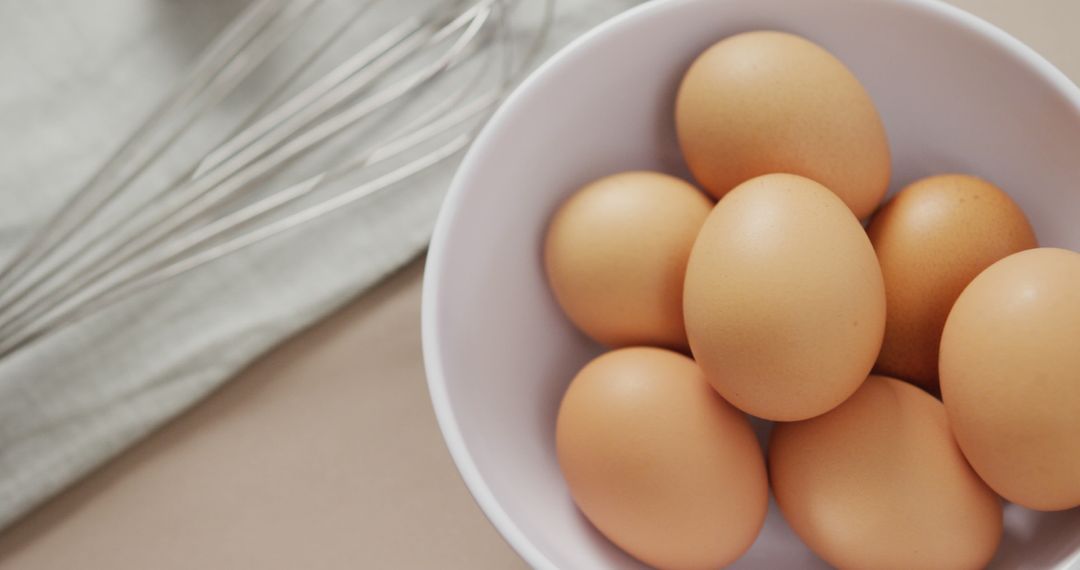 Fresh Brown Eggs in White Bowl on Kitchen Countertop - Free Images, Stock Photos and Pictures on Pikwizard.com