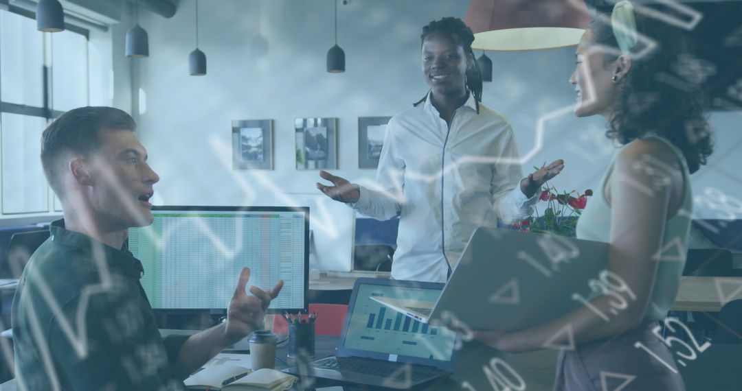 Diverse Team Collaborating on Financial Analysis in Modern Office