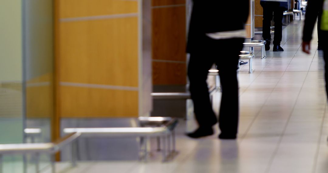 Modern Office Corridor with Walking Employees - Free Images, Stock Photos and Pictures on Pikwizard.com