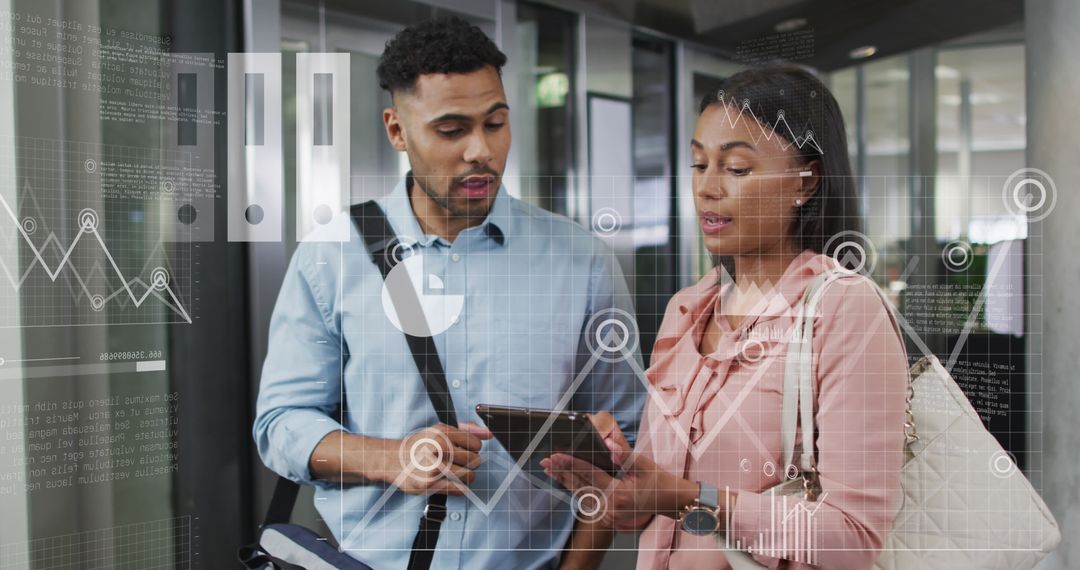 Diverse Professionals Analyzing Financial Data in Office Environment