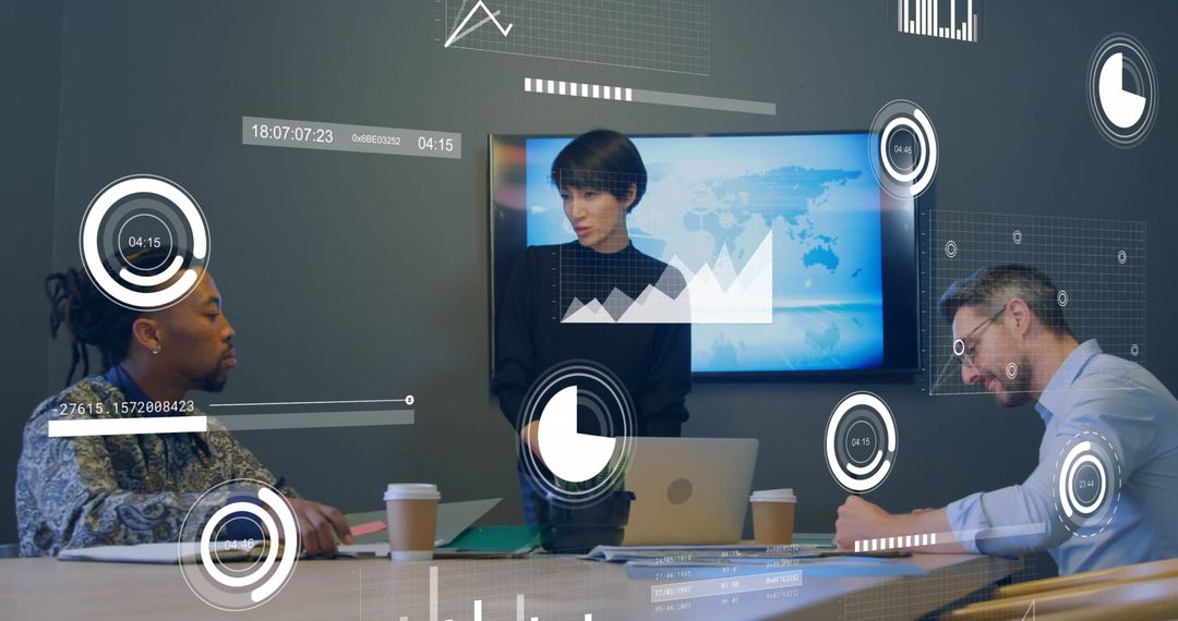 Diverse Colleagues Analyzing Data with Futuristic Visuals in Office