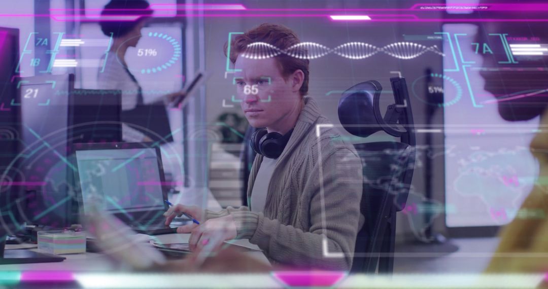 Young Businessman Analyzing Data with Futuristic Interface