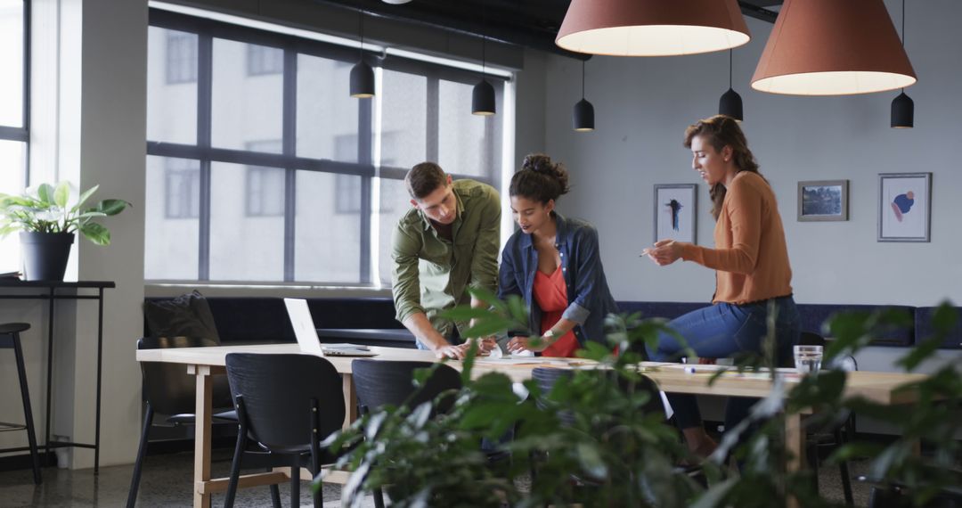 Colleagues Collaborating in Modern Casual Office Space
