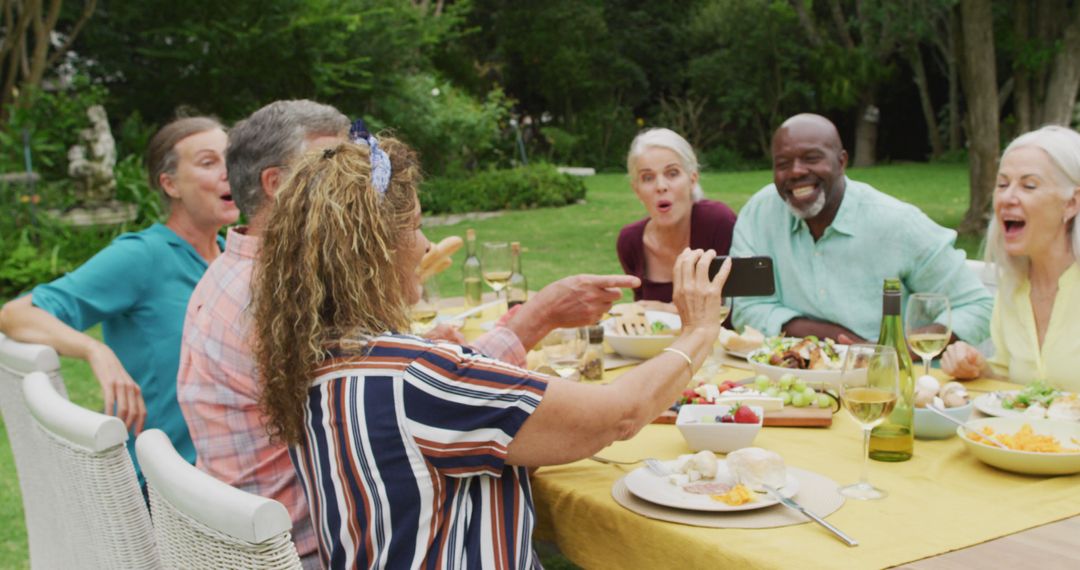 Senior Friends Enjoying Outdoor Dinner Taking Selfie - Free Images, Stock Photos and Pictures on Pikwizard.com