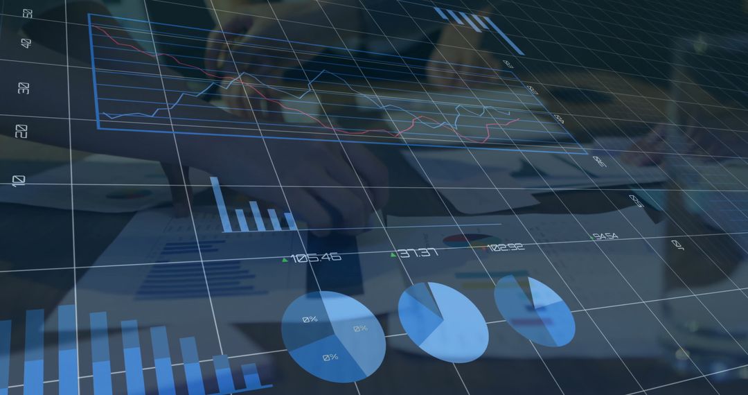 Diverse Coworkers Analyzing Financial Data in Modern Workspace