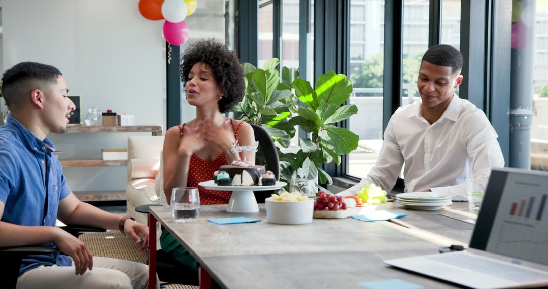 Office Farewell Party with Diverse Colleagues Chatting and Enjoying Cake