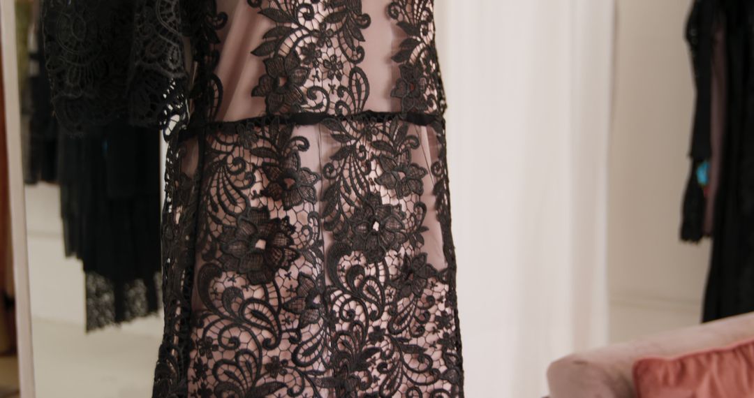 Close-up of Black Lace Dress with Intricate Floral Patterns - Free Images, Stock Photos and Pictures on Pikwizard.com