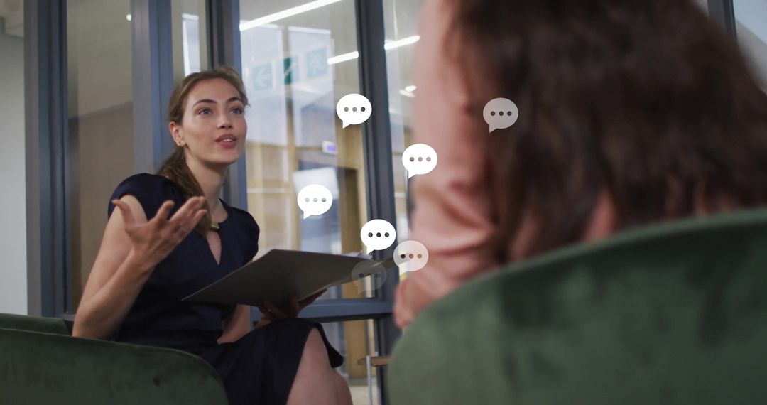 Business Team Engaged in Productive Discussion with Digital Speech Bubbles