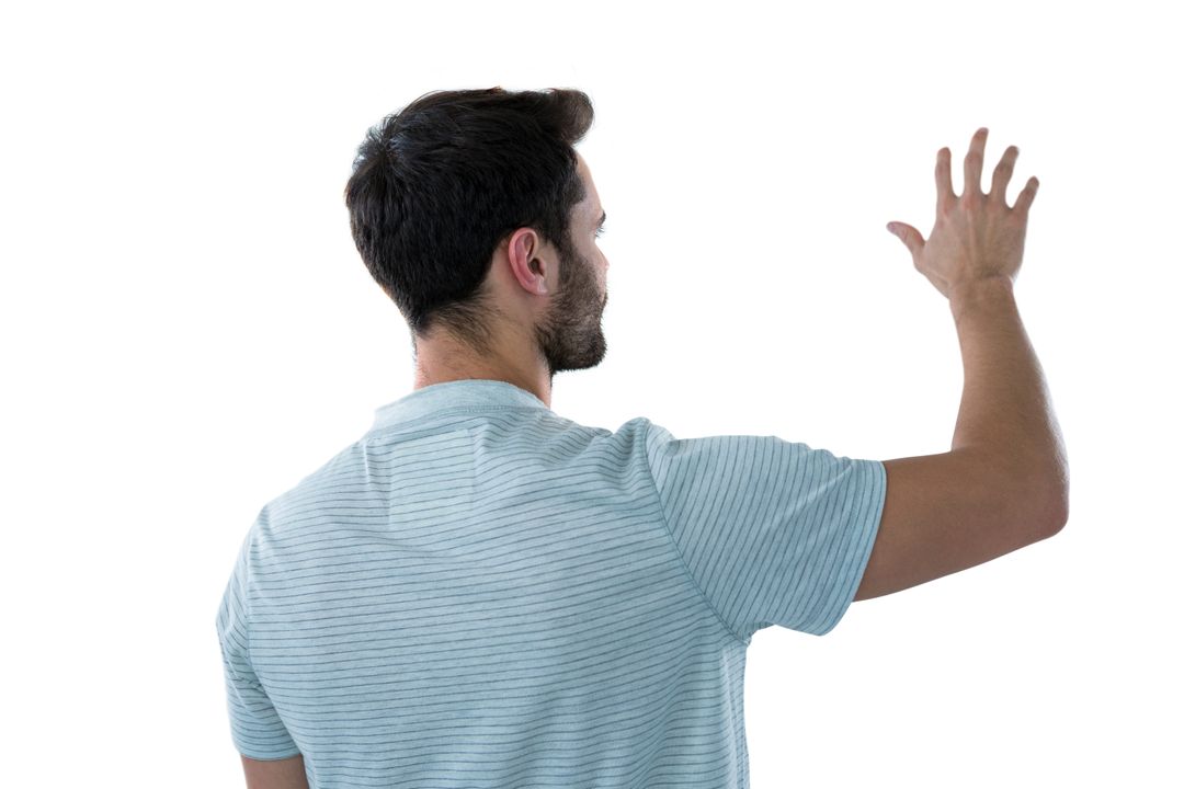 Rear View of Man Pretending to Touch an Invisible Object - Free Images, Stock Photos and Pictures on Pikwizard.com