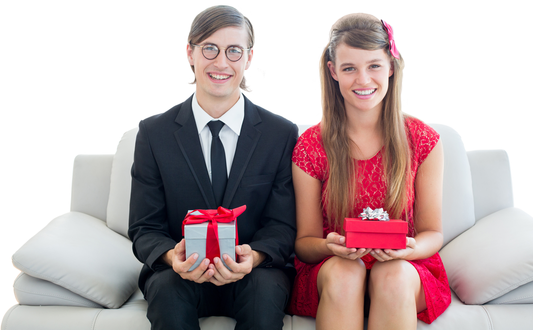 Cute Geeky Couple Smiling and Holding Gift Boxes With Red Ribbons - Download Free Stock Images Pikwizard.com