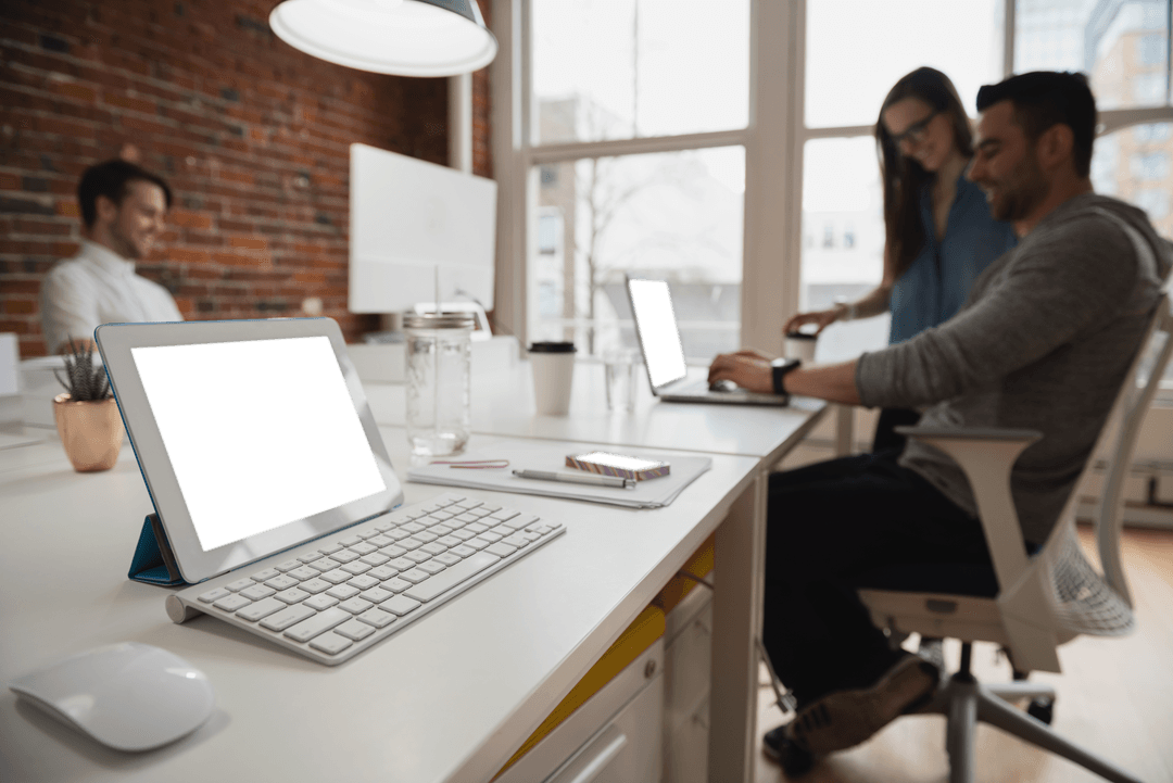 Transparent Background Laptops and Diverse Coworkers in Modern Office