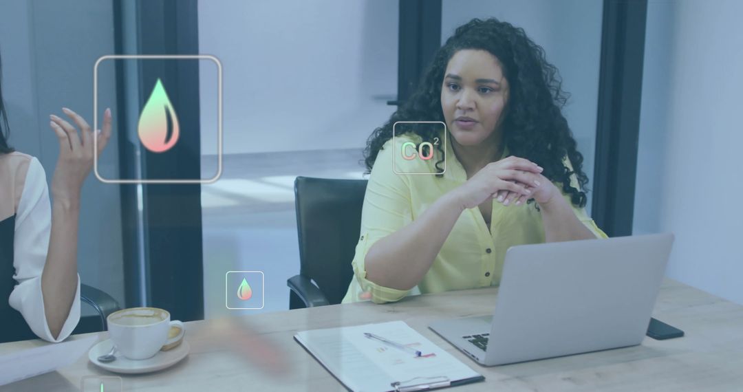 Diverse Colleagues In Meeting with Ecology Icons Overlay