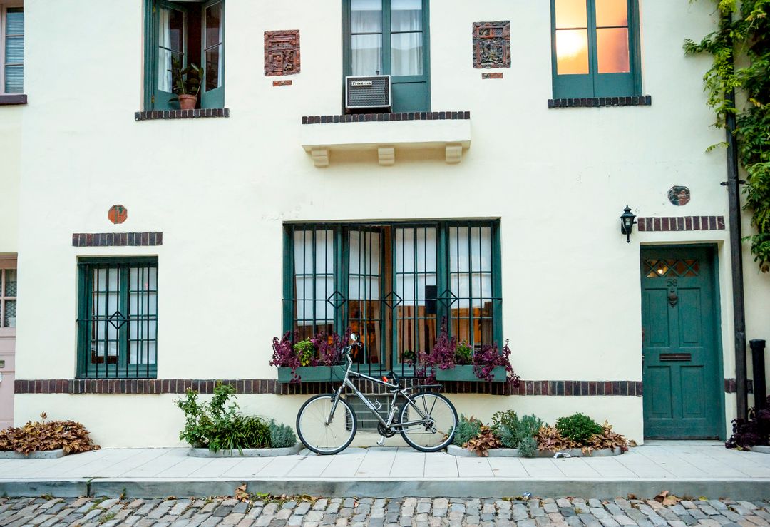 Vintage Bicycle Resting on Tranquil Suburban Street