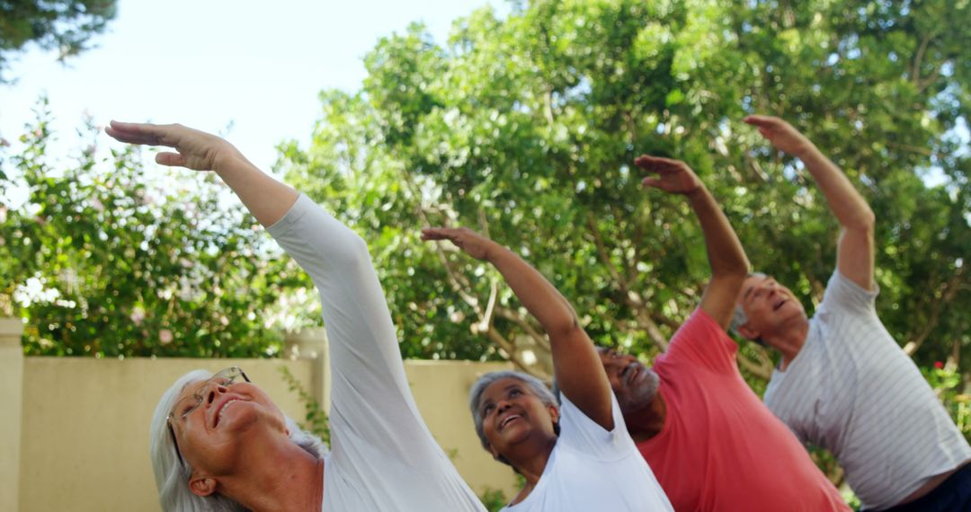 Senior Adults Performing Outdoor Stretching Exercises in Park - Free Images, Stock Photos and Pictures on Pikwizard.com