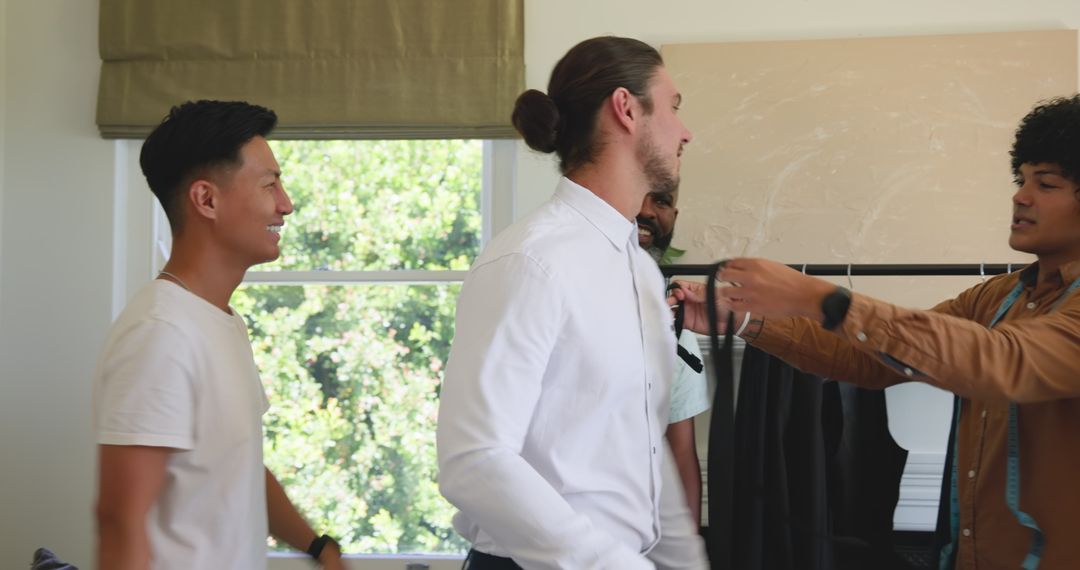 Groom Preparing with Friends Before Wedding Ceremony at Home