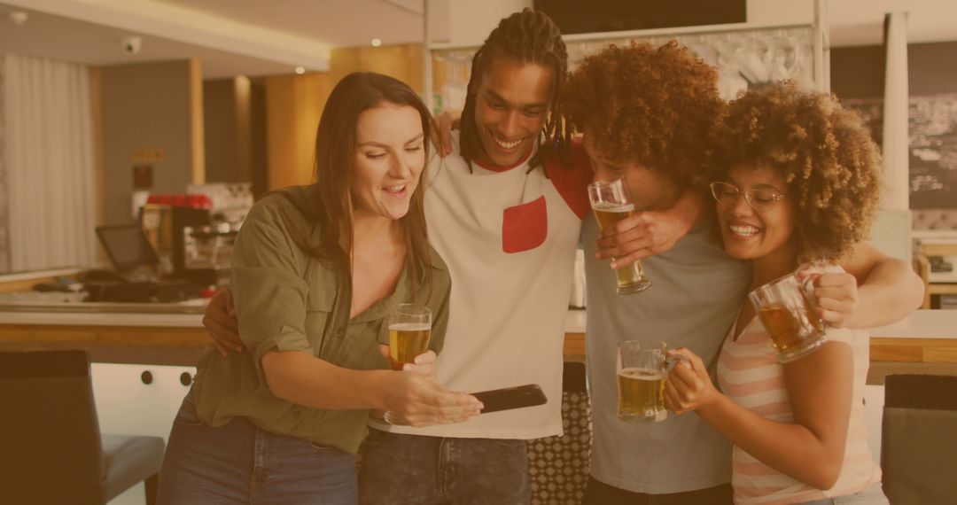 Diverse Friends Enjoying Beer and Sharing Smartphone Laughs