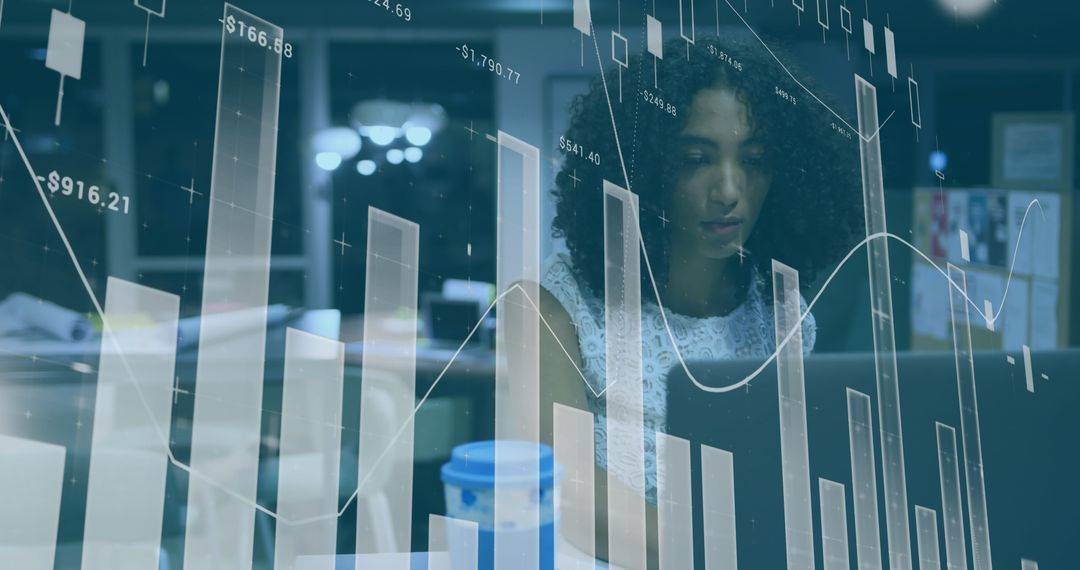 Biracial Businesswoman Analyzing Financial Data in Office