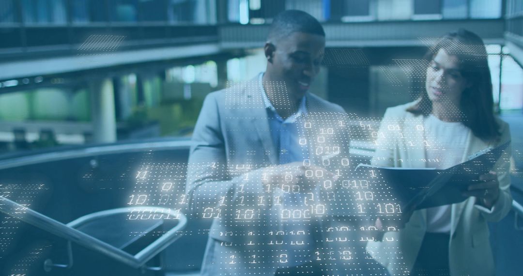 Business Professionals Analyzing Data with Digital Overlay in Modern Office