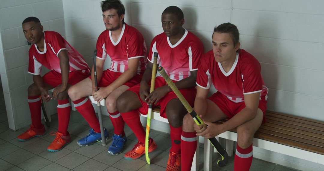 Field Hockey Players Sitting In Locker Room Looking Tense Before Match - Free Images, Stock Photos and Pictures on Pikwizard.com