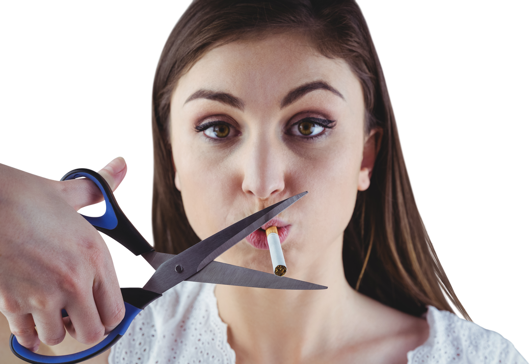 Woman cutting cigarette with scissors symbolizing quitting smoking - Download Free Stock Images Pikwizard.com