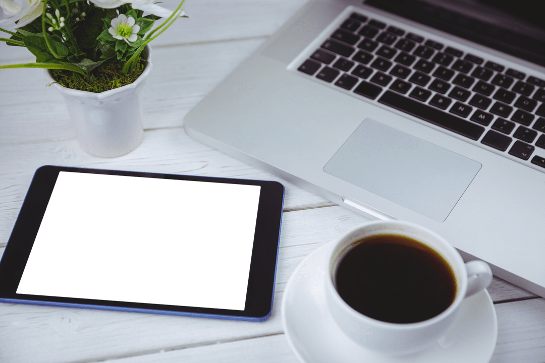 Transparent Workspace with Laptop Tablet Coffee on White Table