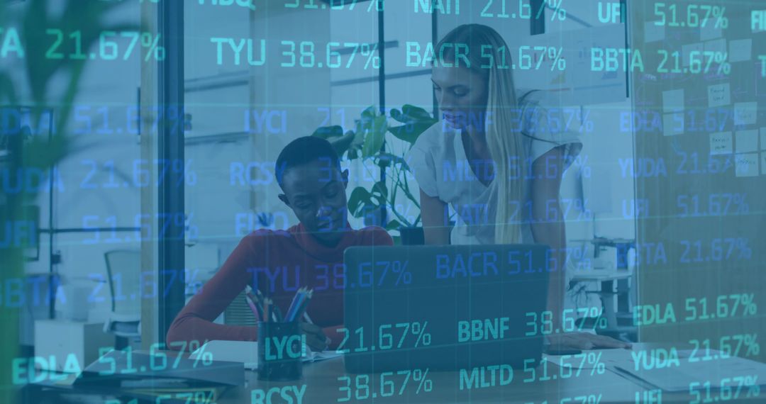 Women Collaborating in Modern Office with Financial Data Overlay